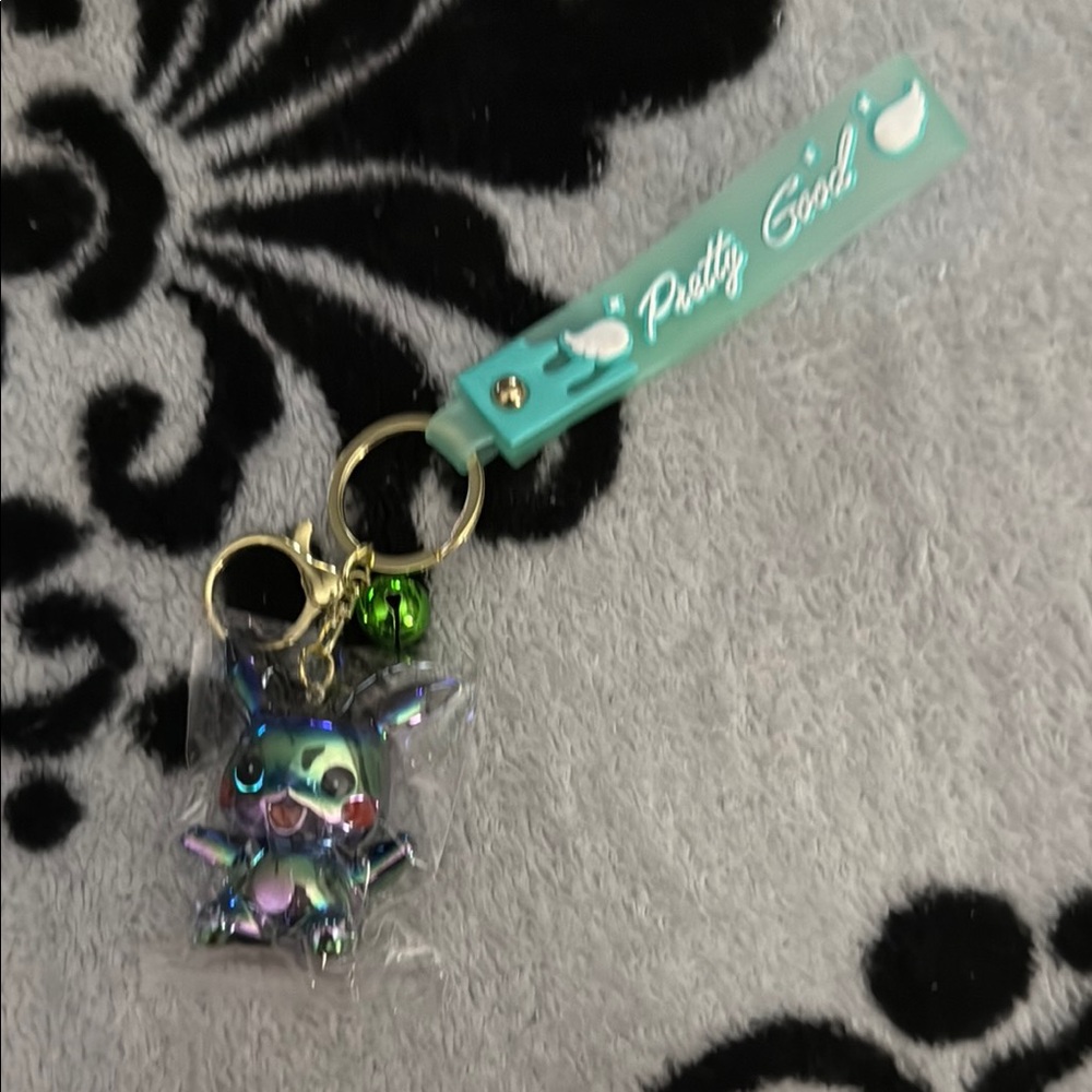 Holographic Green Pikachu Keychain with Wrist strap and gold hardware! New
